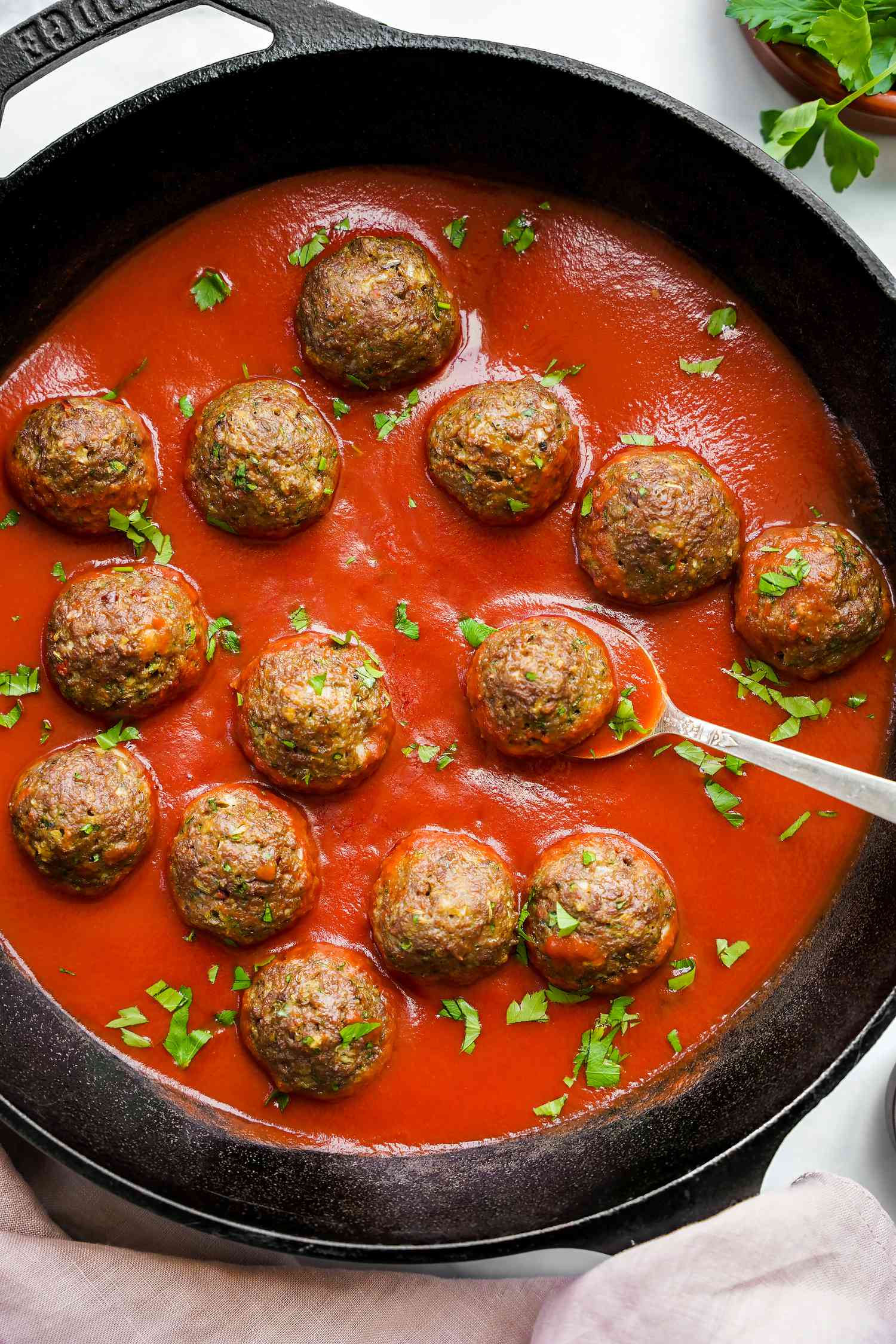 Vegan Meatballs in a Cast Iron Skillet with Tomato Sauce 
