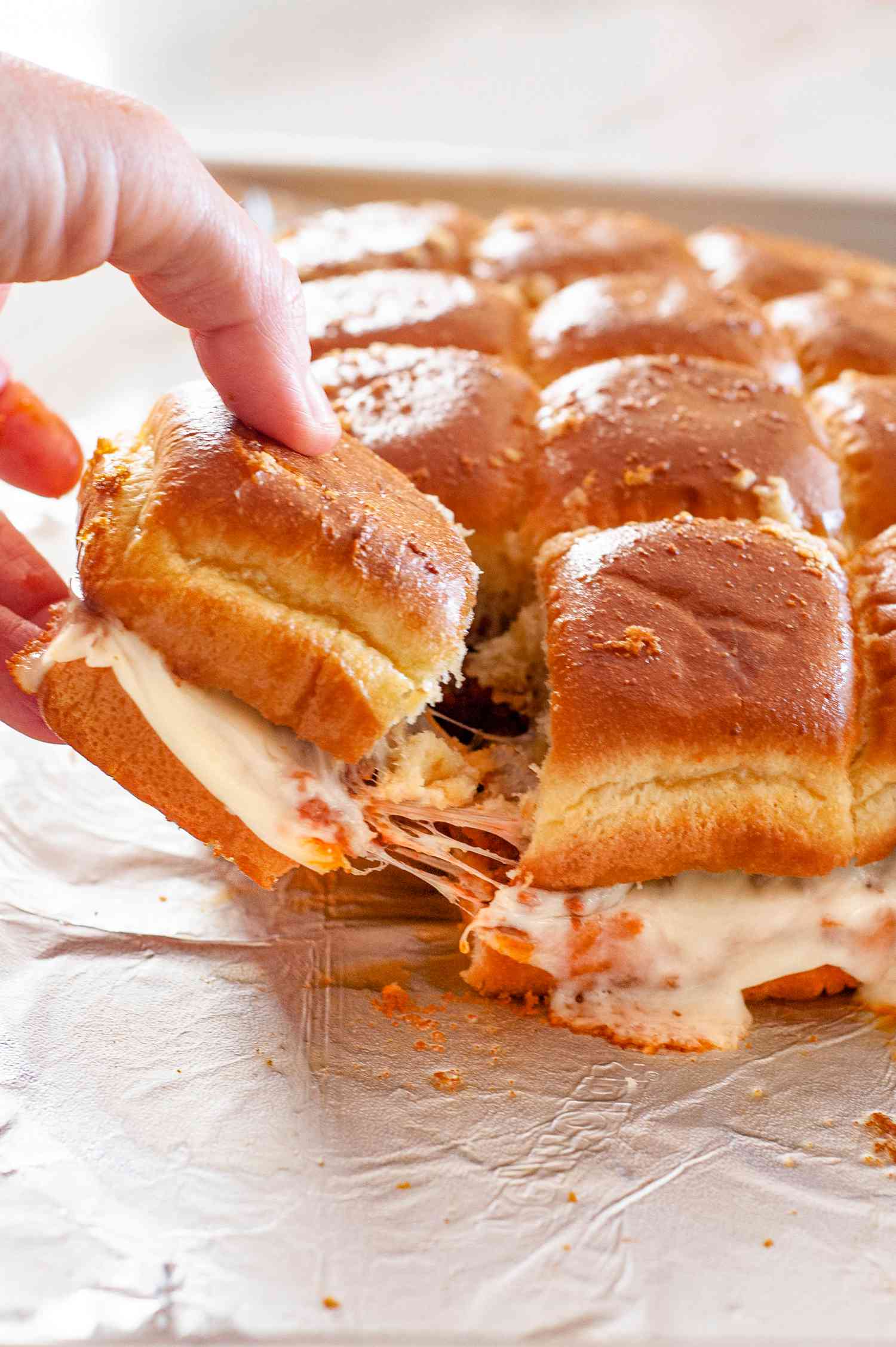Cheesy Pull with Hawaiian Roll Sliders with Meat Sauce and Parm 